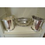A pair of silver plated oval wine coolers and a pierced bread basket