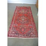 A hand knotted woolen Hamadan rug - rug with repair to one end - 2.60m x 0.