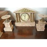 A late 19th Century marble clock and garniture with a key - working in the sale room