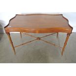 A modern yew veneered coffee table - Height 46cm x 76cm x 46cm