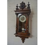 A walnut Vienna style wall clock striking on a gong - Height 92cm - working in the sale room