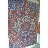 A hand knotted woolen Bakhtiari rug - 3.23m x 2.