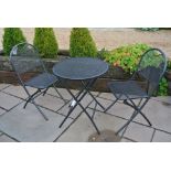 A Bramblecrest folding bistro table and two chairs