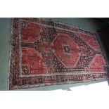 A hand knotted woolen Hamadan rug - 2.80m x 1.