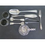 A selection of hallmarked silver items including napkin rings,