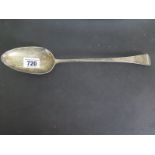 A silver hallmarked serving spoon, London 1802/03 - approx weight 3.
