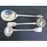 A large silver hallmarked apostle spoon and two smaller ladles - approx total weight 6.