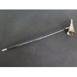 A hallmarked silver candle snuffer with ebonised spiral twist handle - in good condition,