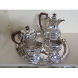 A silver plated tea service consisting tea pot, coffee pot, milk,