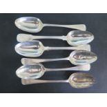 Five hallmarked silver serving spoons and a serving fork - approx weight 12.