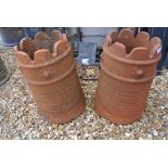 A pair of terracotta chimney pots - 48cm tall