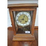 An American striking mantle clock - in working order - 30cm high