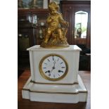 A white marble mantle clock surmounted by a bronze cupid movement by Hollin a Paris - Height 36cm -