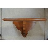 An oak clock bracket - 48cm wide x 28cm