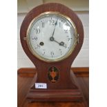 An Edwardian mahogany and inlaid striking balloon clock - in working order