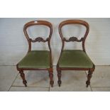 A pair of 19th Century balloon back side chairs