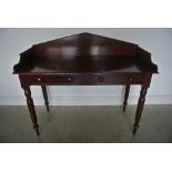 A Victorian Mahogany washstand-side table-desk with two frieze