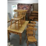 A reclaimed pine table - 180cm x 83cm and six Windsor chairs