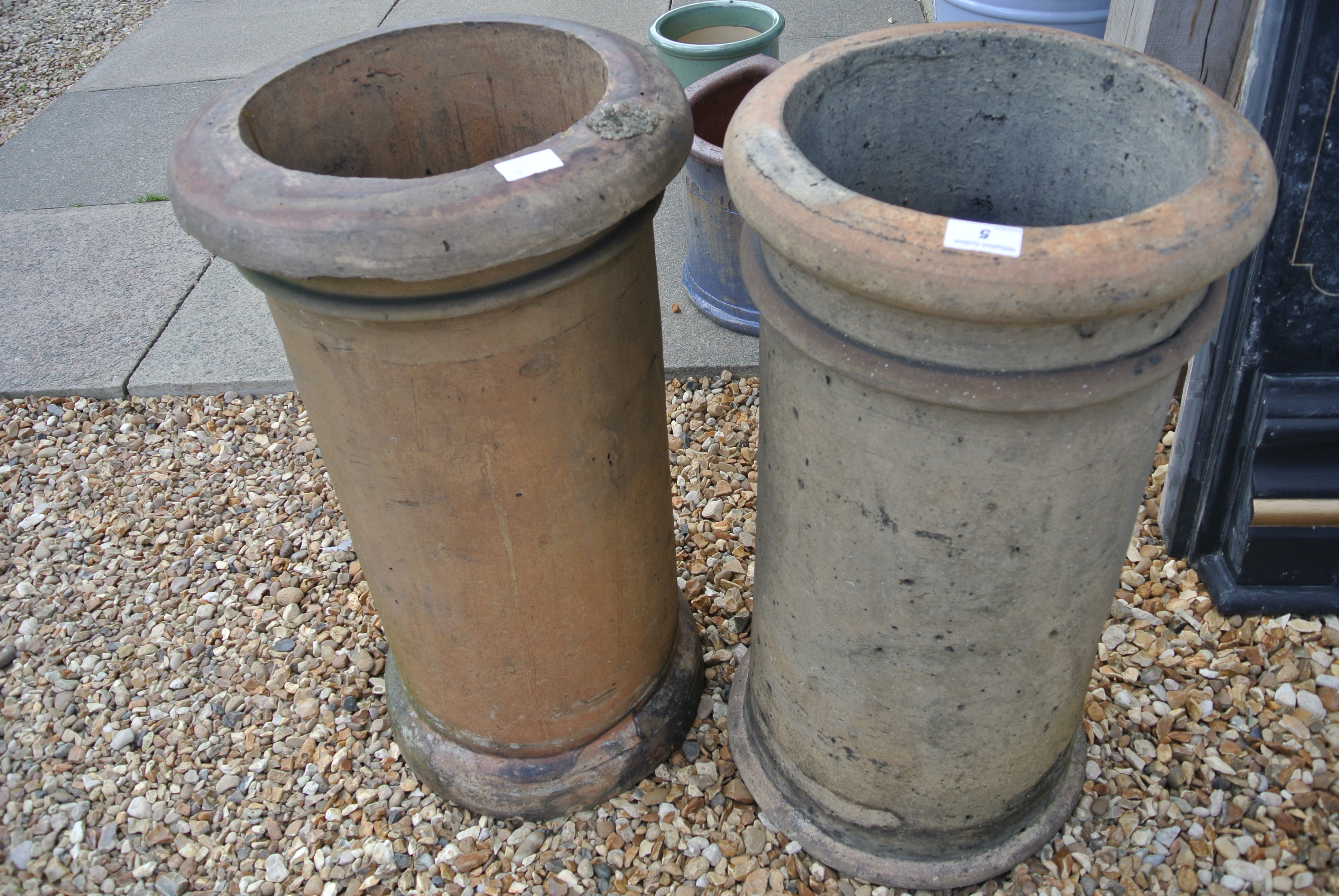 Two cylinder chimney pots,