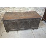 An 18th Century oak coffer with a carved front - 64cm tall x 138cm wide - some wear mainly to the