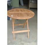 A teak folding table - Diameter 50cm