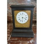 An ebonised mantle clock with a 2 1/2 inch dial signed Frodsham London - the movement numbered 113