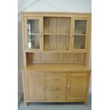 A modern oak veneered dresser - 138cm wide x 193cm - in as new condition