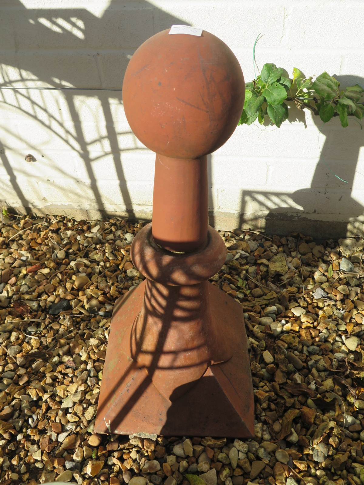 A terracota roof finial - 60cm tall