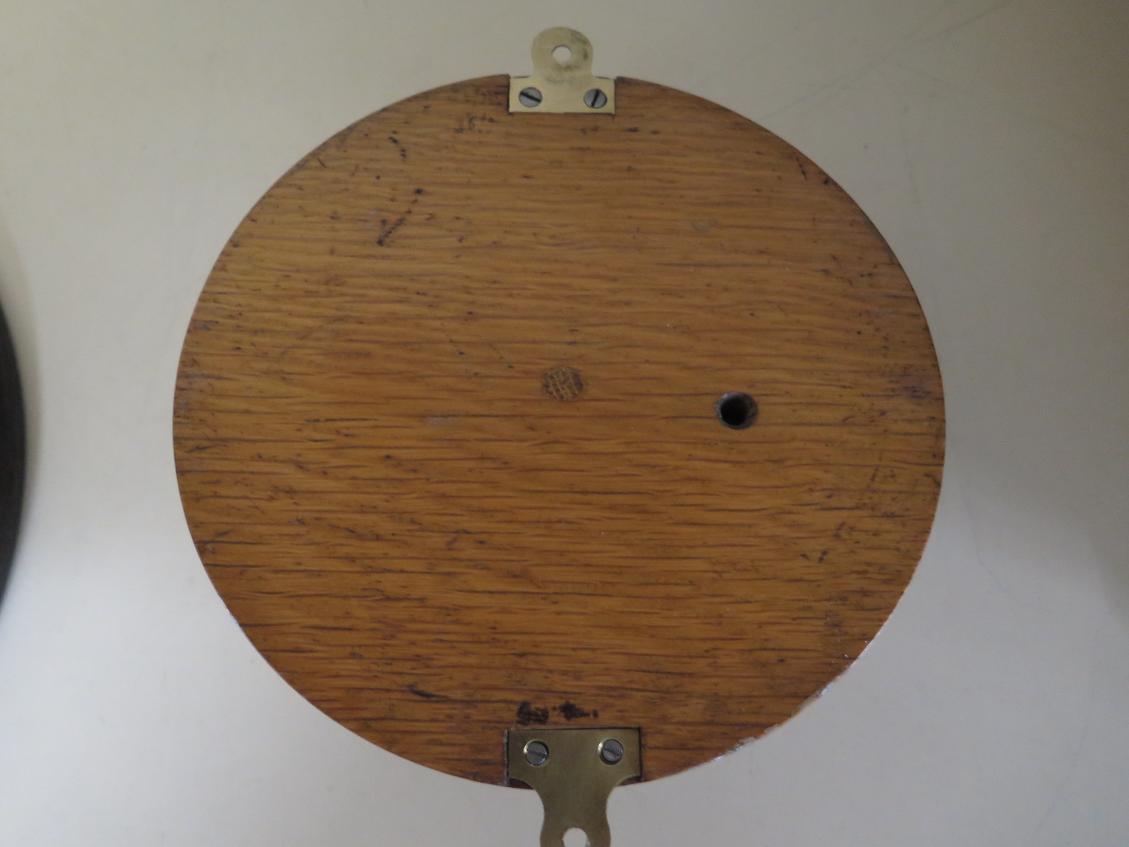 An oak cased aneroid bulkhead barometer by Dolland of London - 17cm diameter - Image 2 of 2