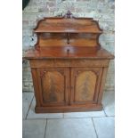 A 19th Century mahogany Chiffonier with a single drawer above two cupboard doors - 134cm tall x