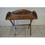 A 19th Century mahogany butlers tray on an associated stand - tray 97cm x 71cm open