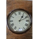 A 12" dial spring drive wall clock - Roman numerals to dial