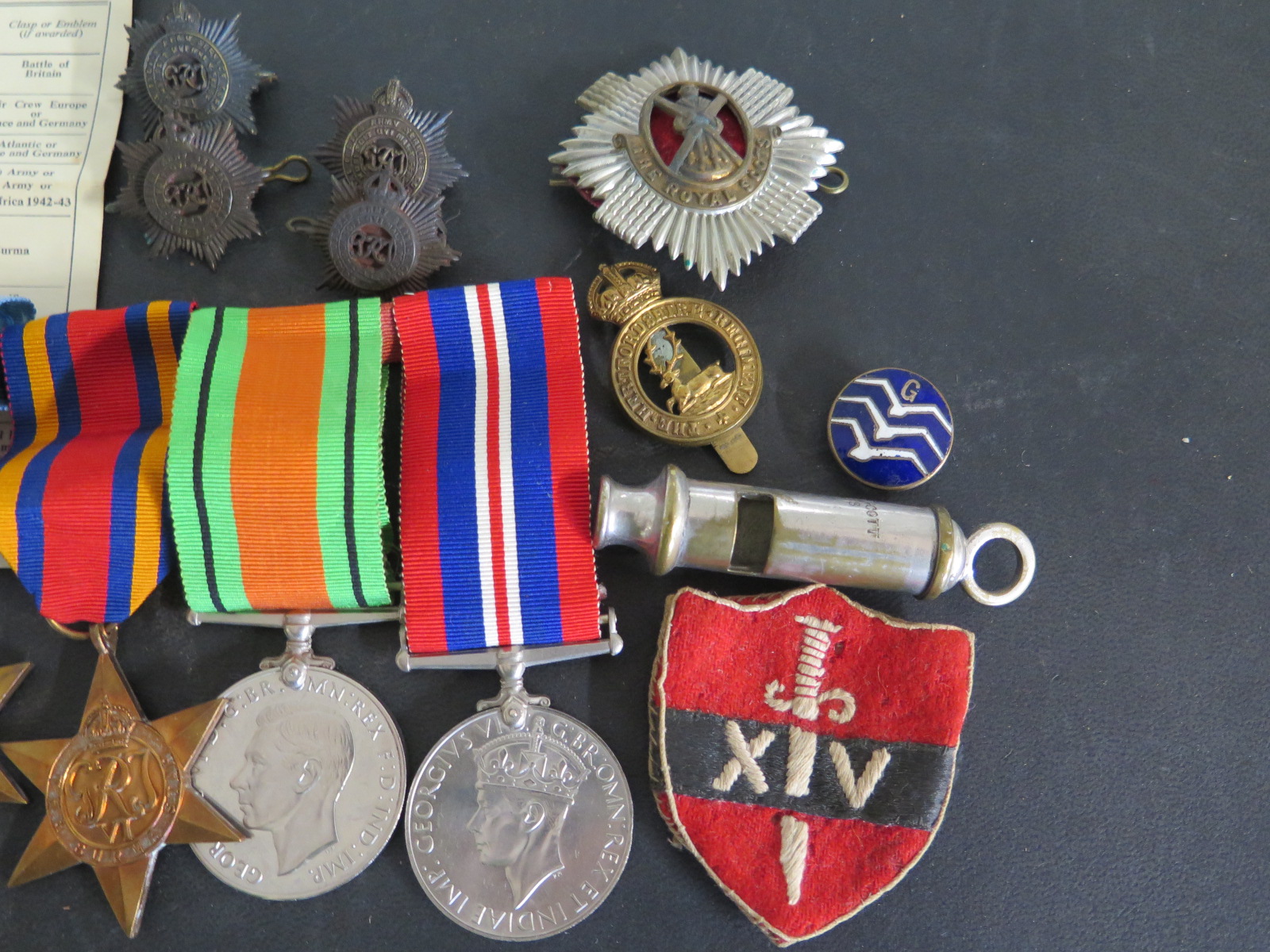 A group of four WWII medals, a George V medal with dress medal, assorted badges, - Image 4 of 6