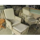 Two Bramblecrest Arlington recliner chairs with footstools and a coffee table