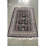 A hand knotted woollen Belouchi Rug - 200 cm x 122 cm - in good condition