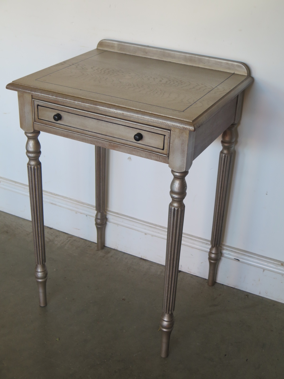 A modern grey side table - Height 73cm x Width 53cm - in good condition - Image 2 of 2