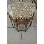 An Islamic Octagonal Top Table with Mother of Pearl inlaid top and base
