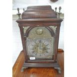 An 18th Century mahogany bracket Viennese Clock with a three train spring movement striking on two