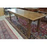 An 18th Century Elm Refectory Table with a good patina and a three plank top - measuring 235 cm x