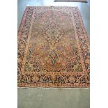 A hand knotted Persian Kashan rug - 2.00m x 1.