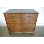 A 19th Century Oak Chest with two short over three long drawers - on bracket feet - 88 cm tall x
