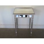 A modern silver side table with a mirrored top - Height 73cm x Width 53cm - in good condition
