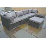 A secondhand Rattan Garden or Conservatory Sofa and two Stools with Cushions - in good condition -