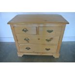 A Victorian stripped pine four drawer chest - 75 cm tall x 89 cm x 44 cm