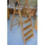 A pine and beech four-step ladder with platform,
