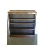 A Victorian four shelf oak bookcase raised on plinth base - 120cm x 30cm x 128cm high