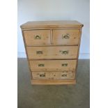 A stripped pine five drawer chest - 92 cm tall x 71 cm x 37 cm