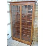 A tall mahogany inlaid cabinet bookcase with adjustable shelves - 173 cm tall x 104 cm x 32 cm