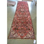 A hand knotted Persian Hamadan rug - 2.78m x 0.