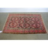 A hand knotted woollen rug - 162 cm x 107 cm